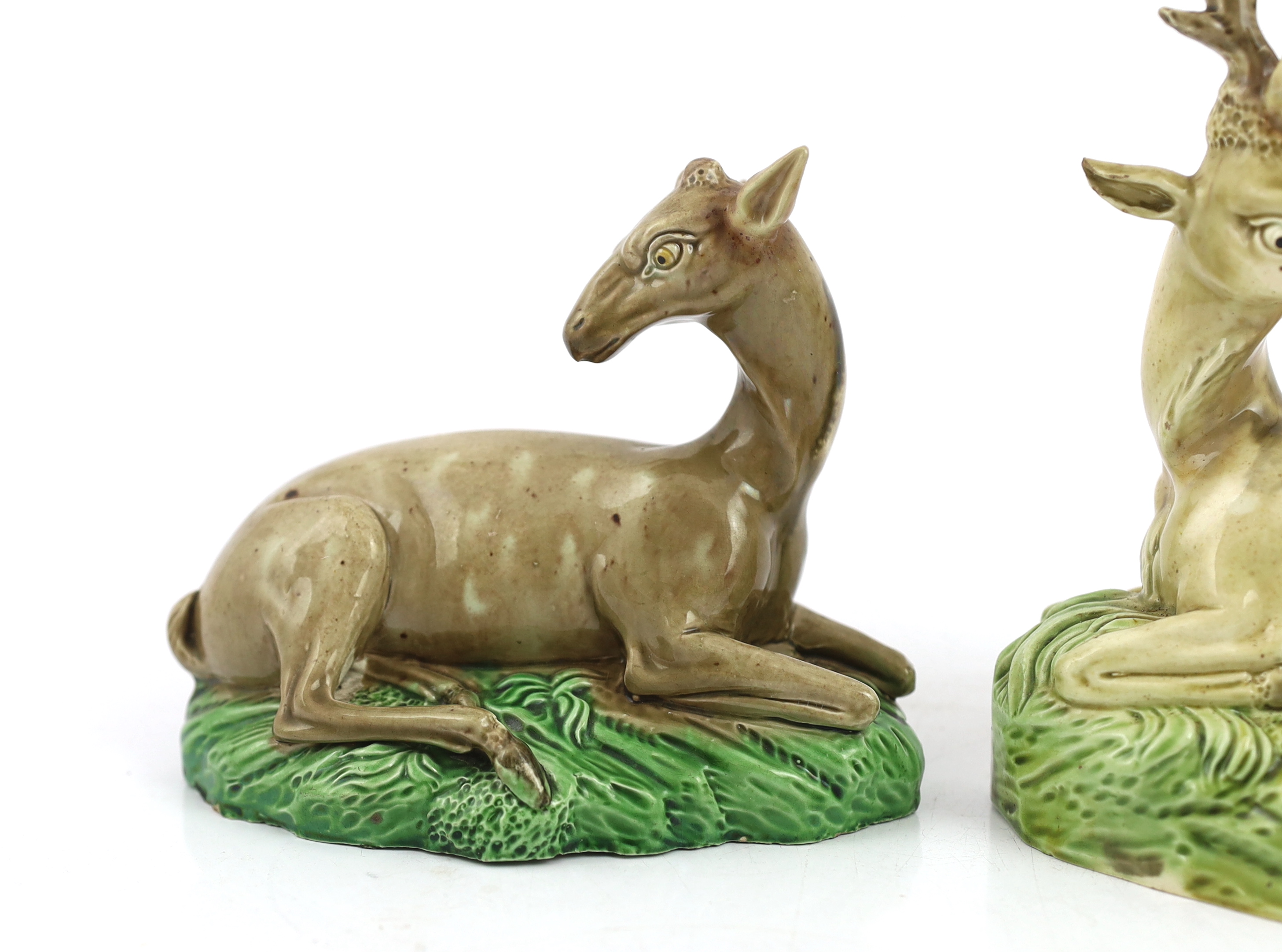 A near pair of Ralph Wood type figures of a Stag and Hind, c.1790, some restoration